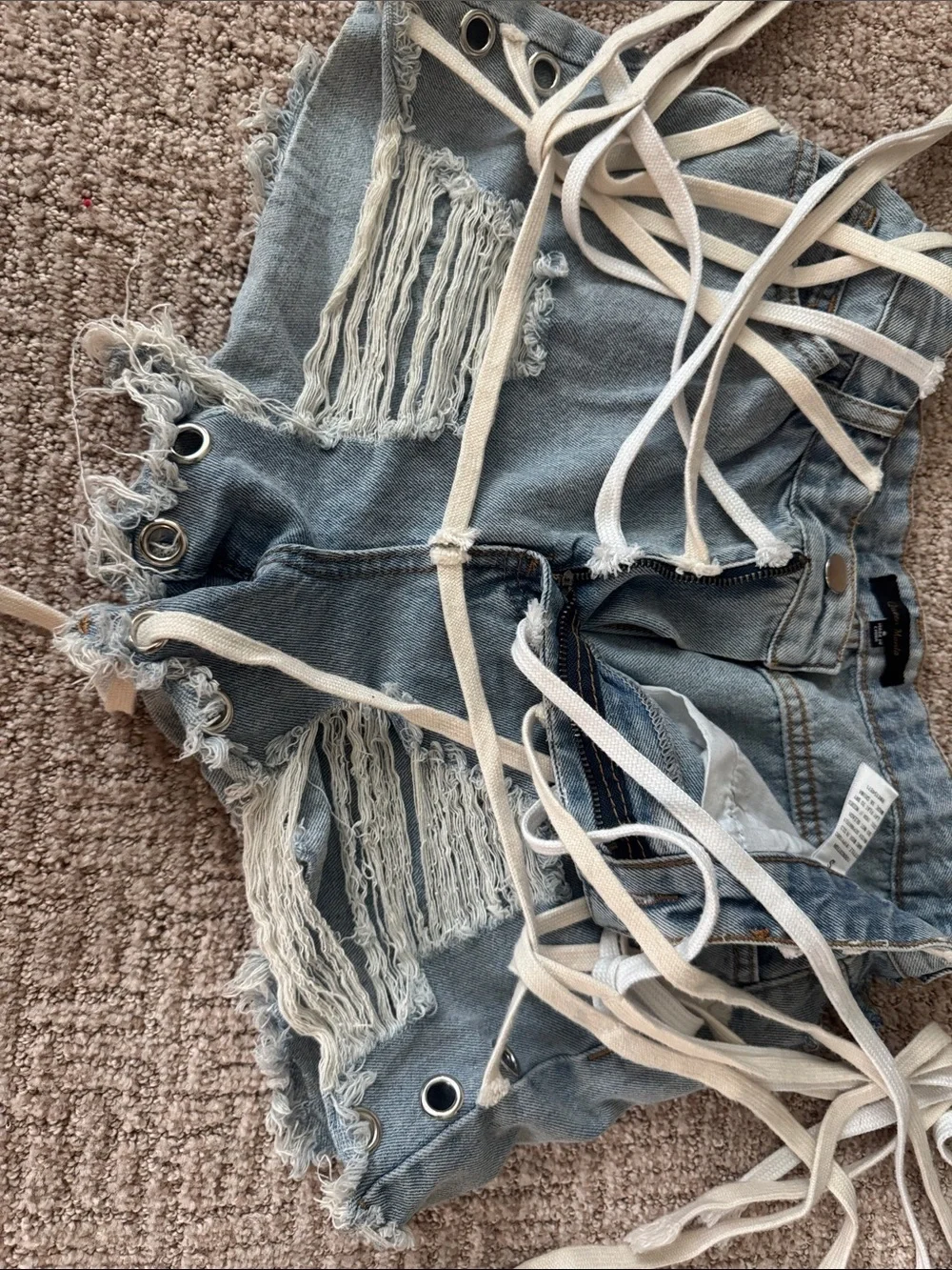 Distressed Light Blue Denim Shoe Lace Grommet Fringe Shorts